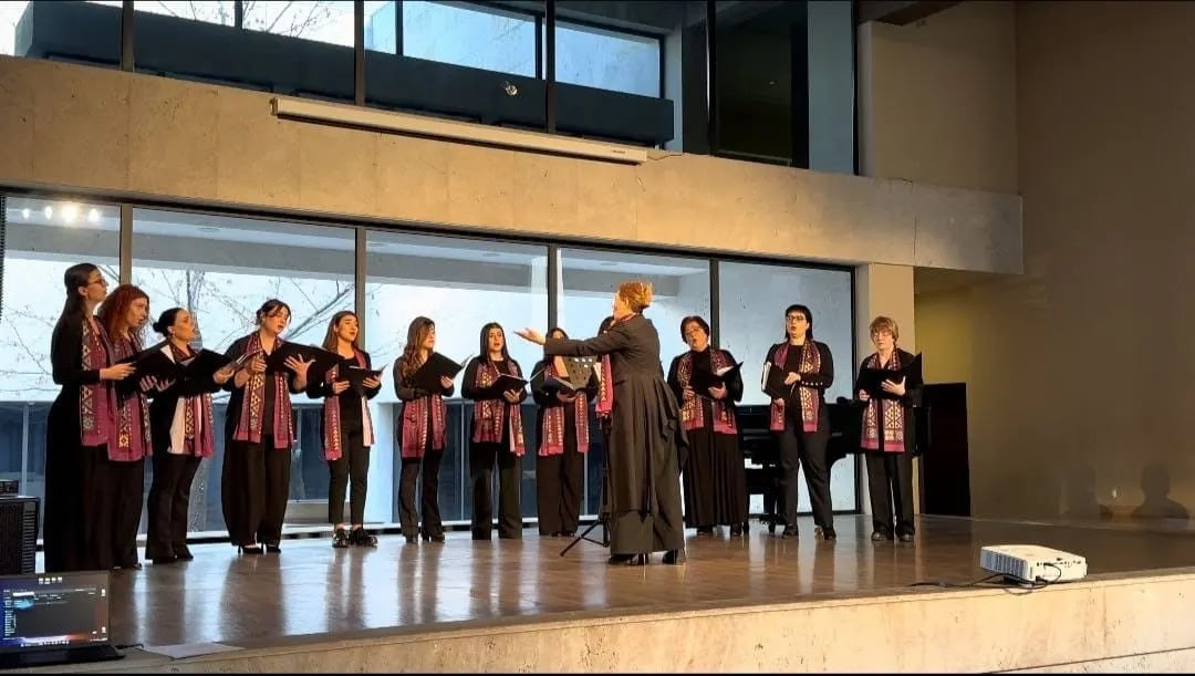 The choir on stage during a 2025 concert